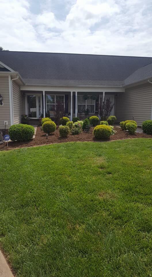 Wrenn's Lawn Service in Hickory, North Carolina - Yard mowing, trimming, mulching, landscaping, yard debris removal, gutter cleaning & routine maintenance.