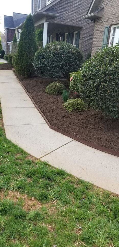 Wrenn's Lawn Service in Hickory, North Carolina - Yard mowing, trimming, mulching, landscaping, yard debris removal, gutter cleaning & routine maintenance.